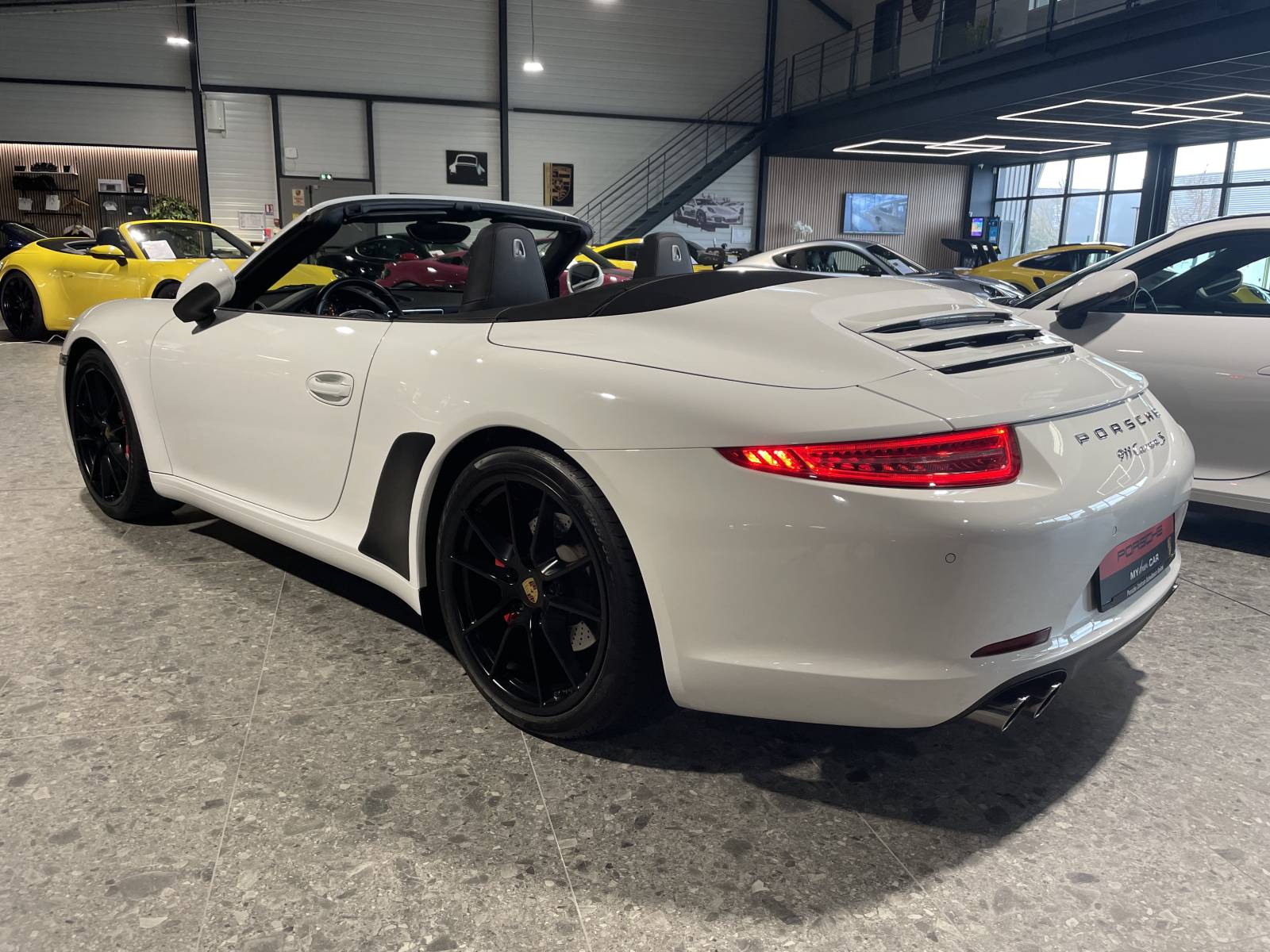 Porsche 991 S Cabriolet : performances et luxe, en vente à Nîmes.